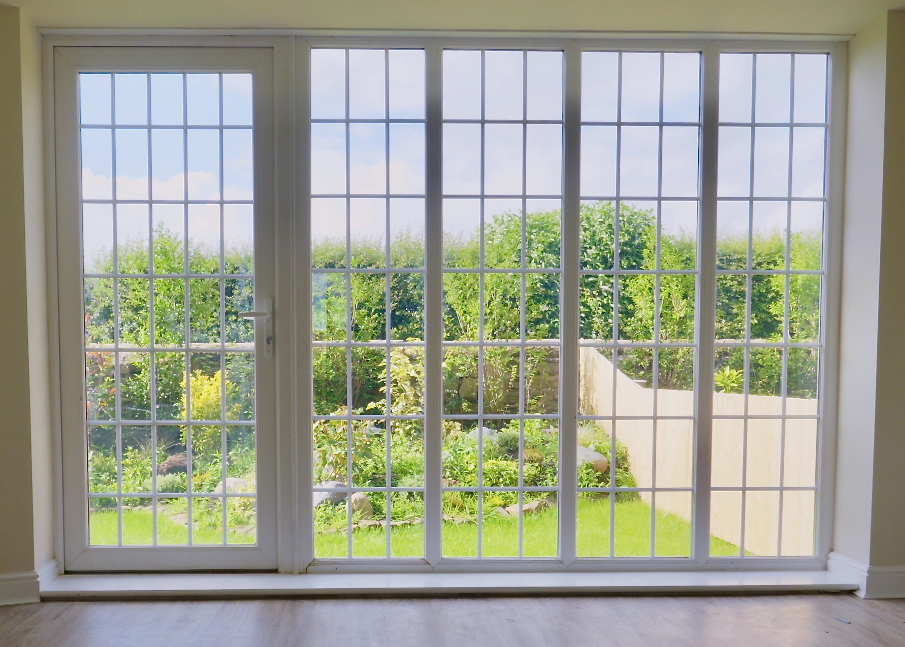 Bright doors looking out onto a garden